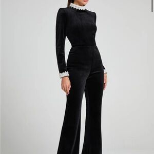 NADINE MERABI Black Jumpsuit with White Lace Accents
